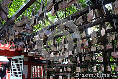 Surrounded by Ema Japanese wooden prayers in Aoshima Shrine of Miyazaki Editorial Stock Photo