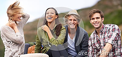 Surrounded by great friends. a young group of friends enjoying themselves on a road trip. Stock Photo