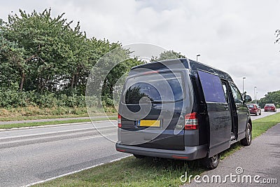 Surveillance of the traffic by a police car taking photos Stock Photo