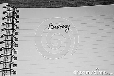 Survey, handwriting text on page of office agenda, office spiral notebook. Copy space Stock Photo