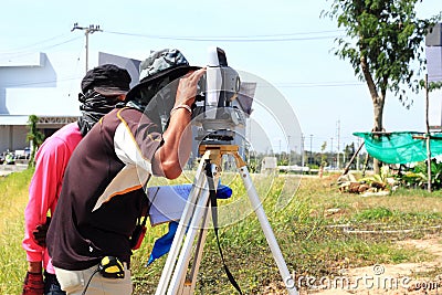 Surveyor engineer making measuring Stock Photo