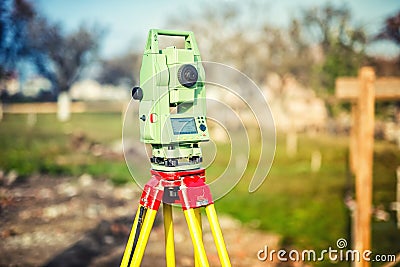 Surveyor engineering equipment with theodolite and total station at a construction site Stock Photo