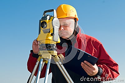Surveyor theodolite works Stock Photo