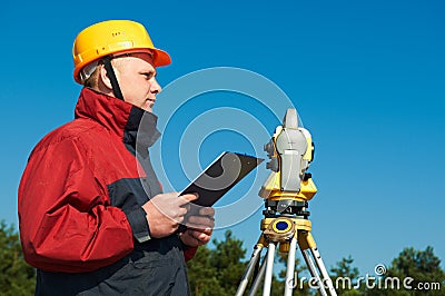 Surveyor worker with theodolite Stock Photo