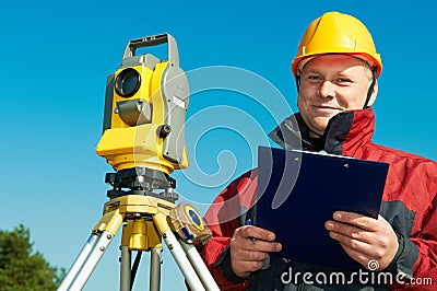 Surveyor worker with theodolite Stock Photo