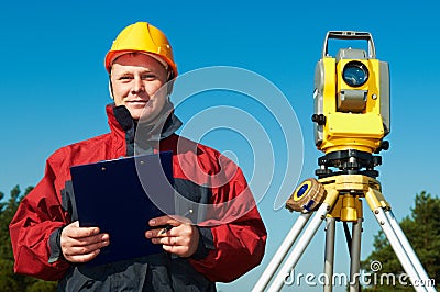 Surveyor worker with theodolite Stock Photo