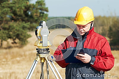 Surveyor worker with theodolite Stock Photo