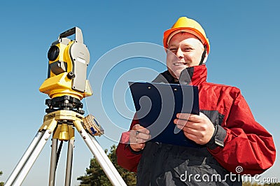 Surveyor worker with theodolite Stock Photo