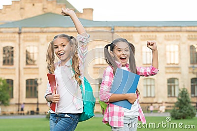 We survived school. Happy children celebrate outdoors. School holidays. Summer holidays or vacation. School is out Stock Photo
