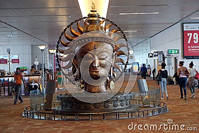 Surya, the big golden statue in international Airport of Delhi Editorial Stock Photo