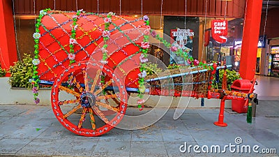 Old traditionally decorated bullock cart in display in front of the store during pongal Editorial Stock Photo