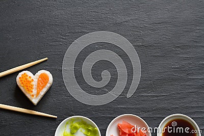 Sushi abstract seafood heart concept on black marble menu background Stock Photo