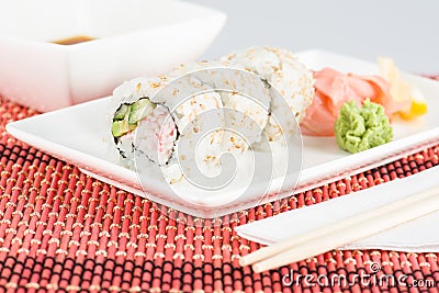 Sushi closeup with sticks, sauce Stock Photo