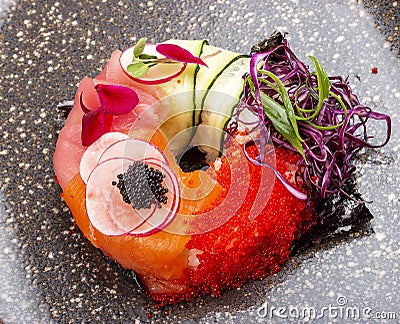 Sushi donut on a ceramic plate. Sushi trend. Creative food Stock Photo