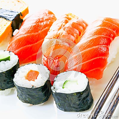 `Sushi `Japanese cuisine, rice decorated with salmon fillets and shrimp,Rice wrapped in seaweed Stock Photo