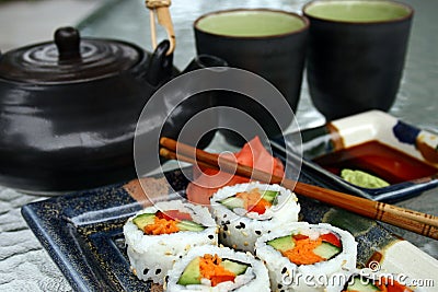 Sushi meal with teapot and cup Stock Photo