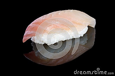 Sushi nigiri with grouper on black background with reflection. J Stock Photo