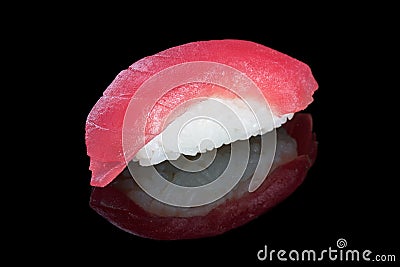 Sushi nigiri with tuna on black background with reflection. Japa Stock Photo