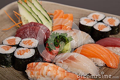 Sushi plate and assorted sashimi. Isolated image Stock Photo