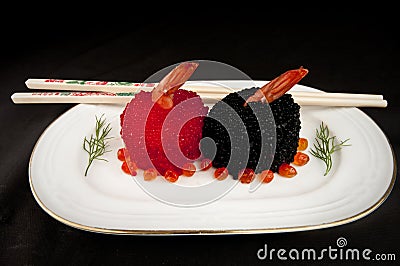 Sushi with red and black fish eggs. Stock Photo
