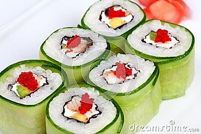 Sushi roll with avocado, cucumber and caviar Stock Photo