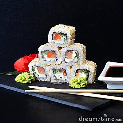 Sushi roll sushi with prawn, avocado, cream cheese, sesame. Sushi menu. Stock Photo