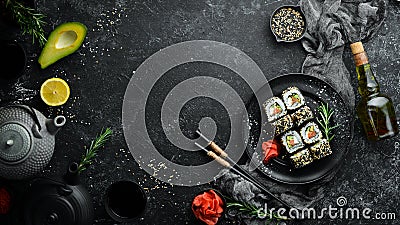 Sushi Rolls - California with sesame, salmon and avocado Stock Photo