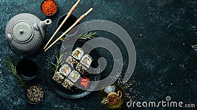 Sushi Rolls - California with sesame, salmon and avocado. Stock Photo