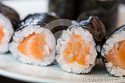 Sushi salmon maki in Japanese restaurant Stock Photo