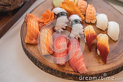 Sushi set on wooden plate Stock Photo