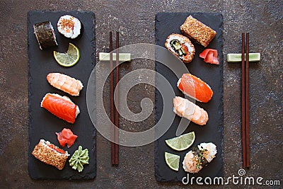 Sushi and sushi rolls, sushi nigiri on stone plate Stock Photo