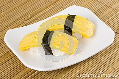 Sushi - Tamago Nigiri Stock Photo