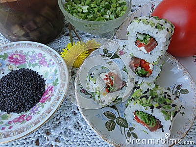 Sushi tomato cucumber, cooking vegetarian food Stock Photo