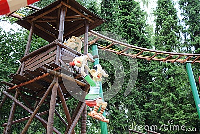 Suspended roman afraid with an gauls above dolls from Epidemais Croisiere attraction at Park Asterix, Ile de France, France Editorial Stock Photo