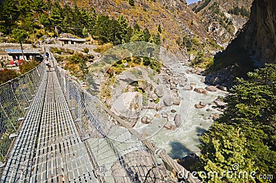 Suspension bridge en route to Everest, Himalaya Editorial Stock Photo