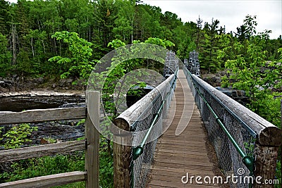 Jay cooke state park suspension bridge over the st louis river Stock Photo