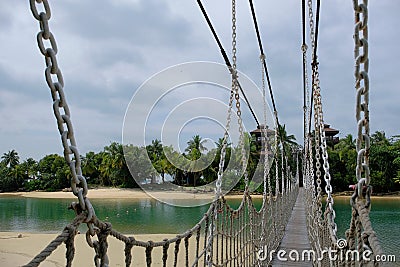 Suspension bridge leading from Palawan Beach in Sentosa Island, Singapore, to `the Southernmost point of Continental Asia` Stock Photo