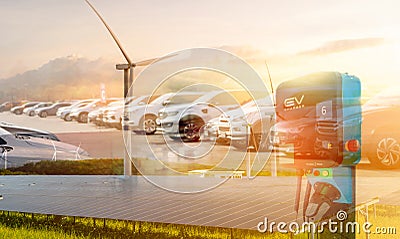 Sustainable energy for electric vehicle. EV car with electric vihicle charging station. Solar and wind turbine farm. Renewable, Stock Photo