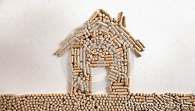 Sustainable Haven: Wood Pellets Build a Home Stock Photo