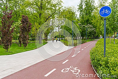 Sustainable transport. Blue road sign or signal of bicycle lane Editorial Stock Photo