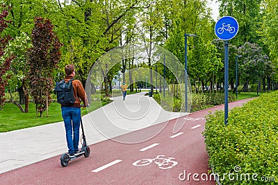 Sustainable transport. Blue road sign or signal of bicycle lane Editorial Stock Photo