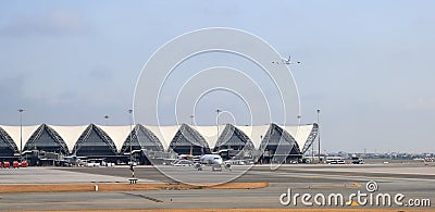 Suvarnabhumi Airport view, Airplane parking at passenger gate Editorial Stock Photo