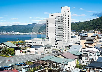 View of Kamisuwa onsen, a hot spring resort on the shores of Lake Suwako Editorial Stock Photo