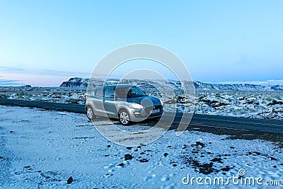 Suzuki swift car on a winter snowy road Editorial Stock Photo