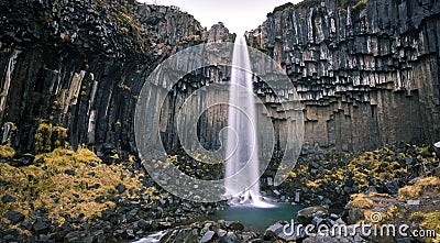 Svartifoss Waterfall and Sjonarnipa at Skaftafell national park in south Iceland southern Iceland Stock Photo