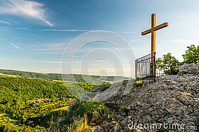 Svaty Jan pod Skalou summit cross at sunrise, Beroun District, Central Bohemian Region, Czech Republic Stock Photo