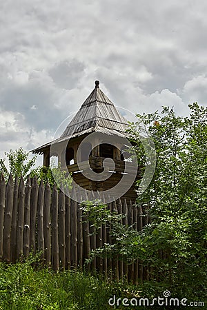 Wooden tower and fence on the territory of the All Saints Skete Editorial Stock Photo