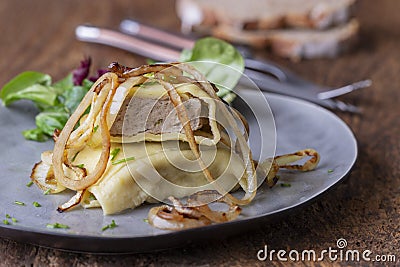 Swabian maultasche with onions Stock Photo