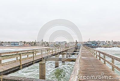 View of the historic jetty with Swakopmund in the back Editorial Stock Photo