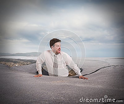 Swallowed by asphalt Stock Photo